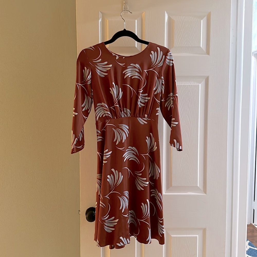 Loft Size 8 P. 100% polyester. Not lined as not see thru. 3/4 sleeve.